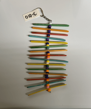 Colorful popsicle sticks hanging toy for birds.